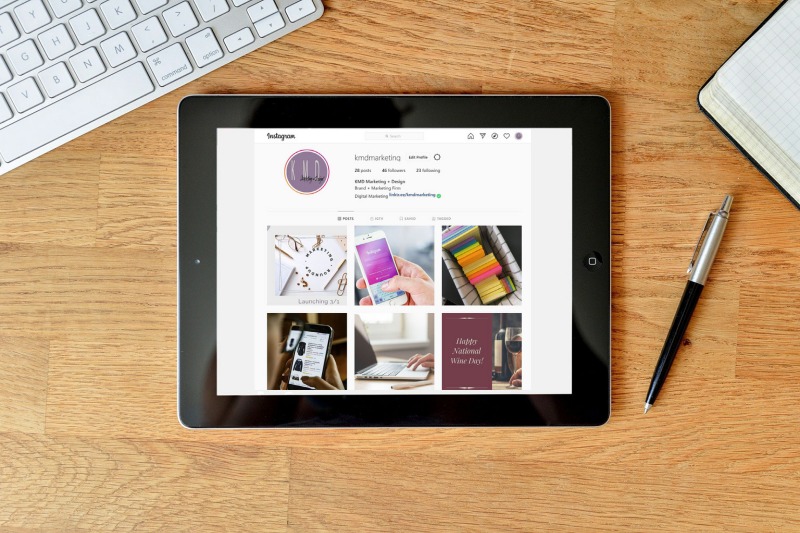 Instagram feed of KMD Marketing and Design on a tablet showing you How to Grow your following